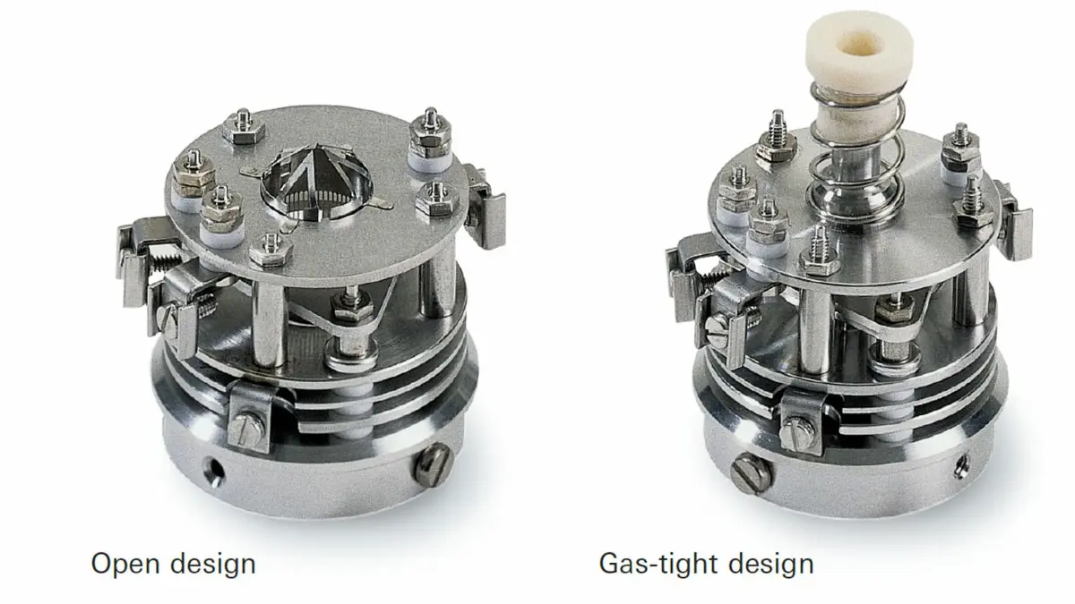 Two PrismaPlus ion sources showing an open design on the left and a gas-tight design on the right, both metallic with mechanical components